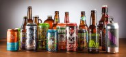 lineup of beer cans and bottles