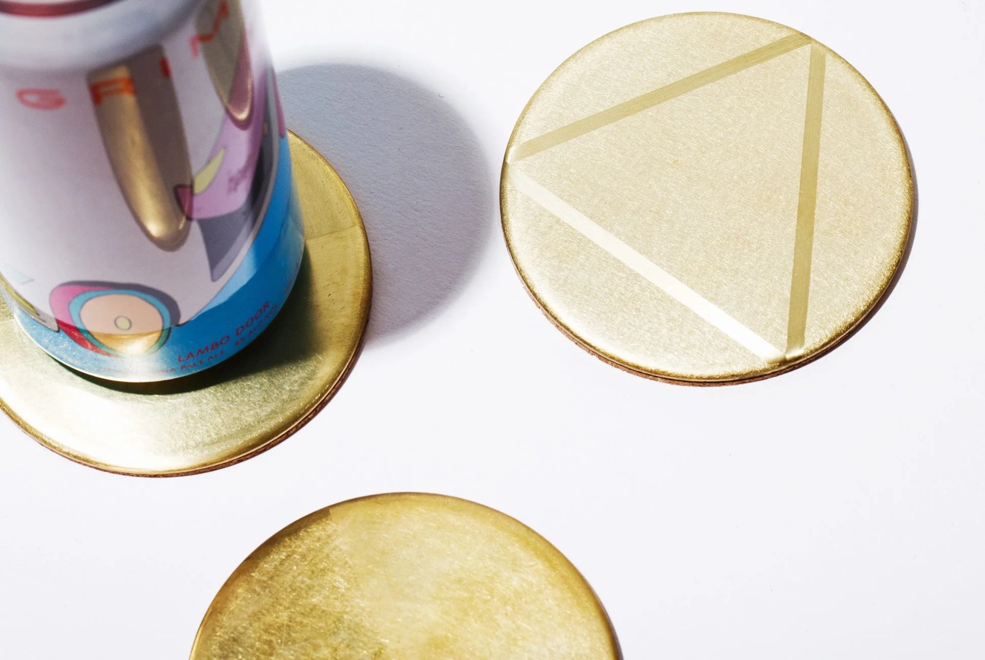 Beer-Coasters-Gear-Patrol-Brass