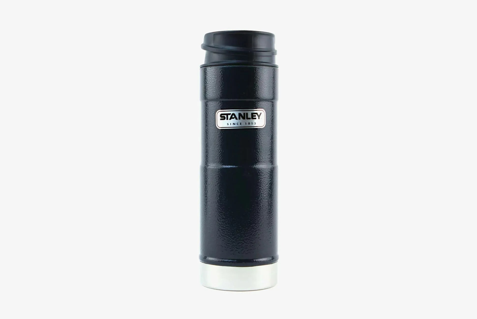 a navy blue travel mug