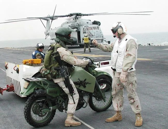 Vehicle, Mode of transport, Military, Army, Motorcycle, Military organization, Helicopter, Soldier, Troop, Rotorcraft,