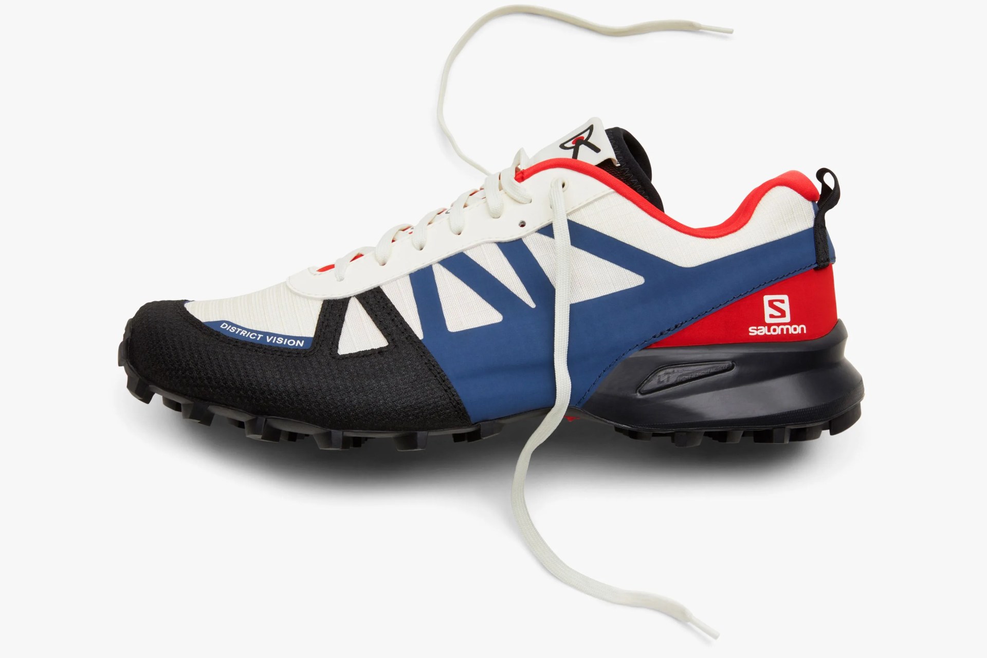 red white and blue salomon sneaker with black sole