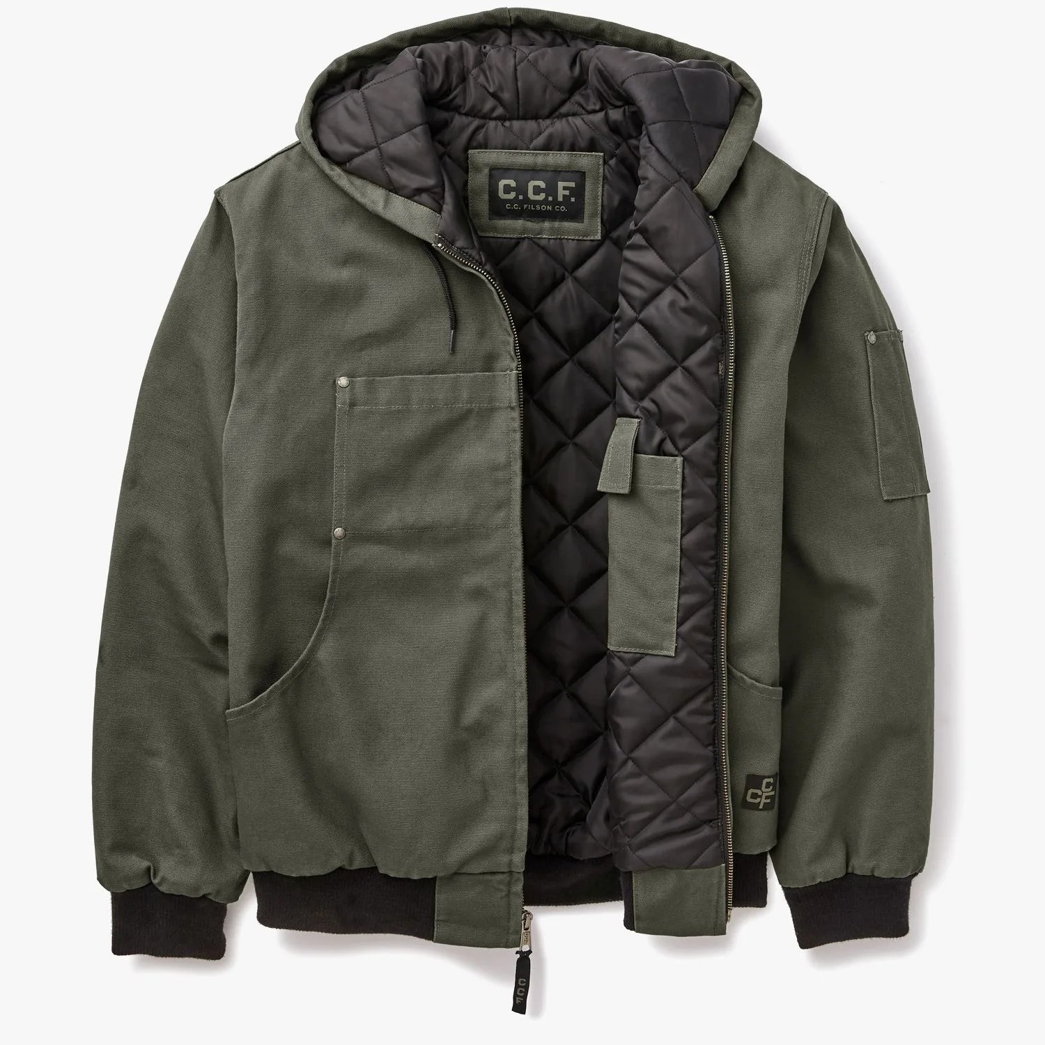green filson jacket with hood and a quilted interior