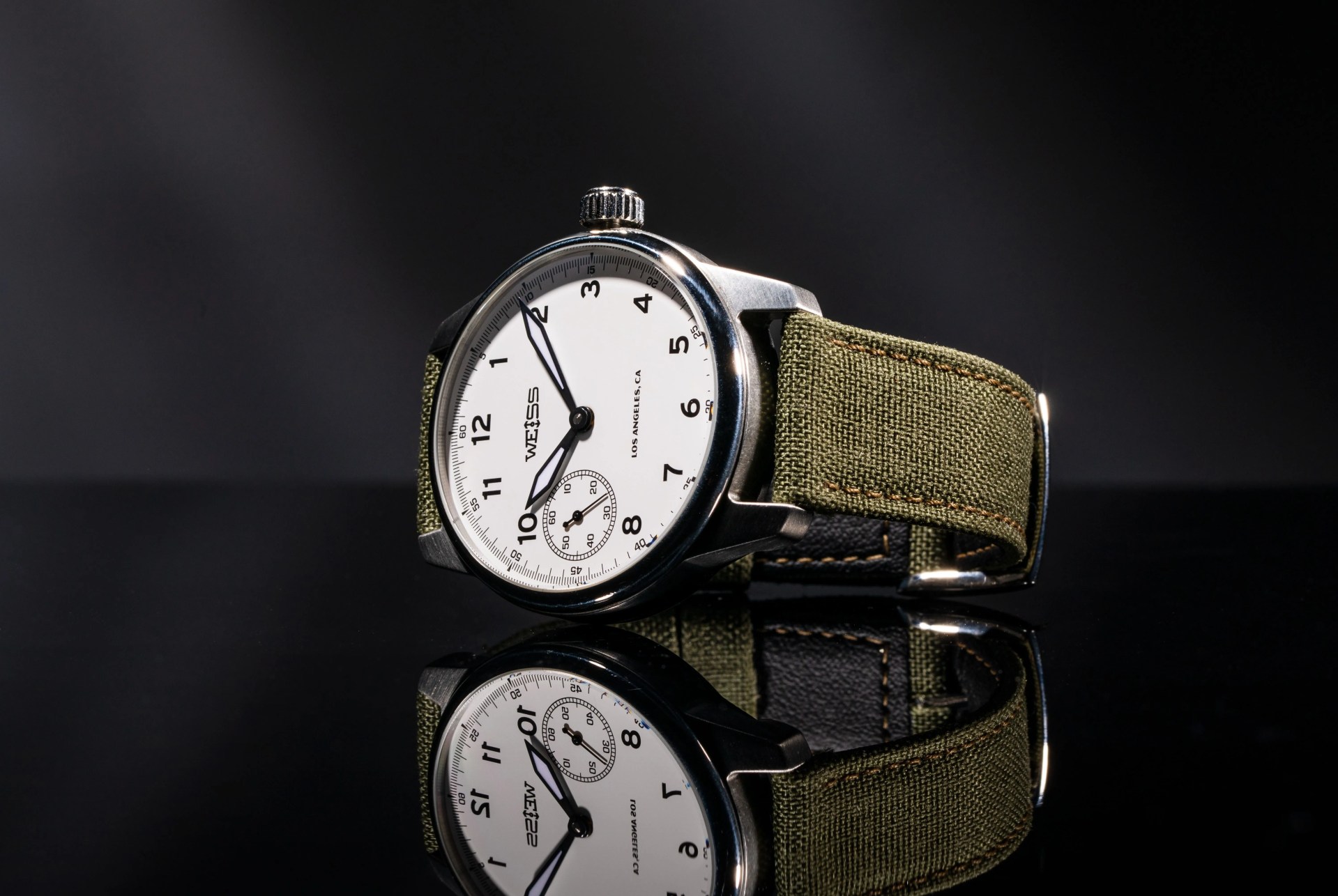 weiss watch with a green strap