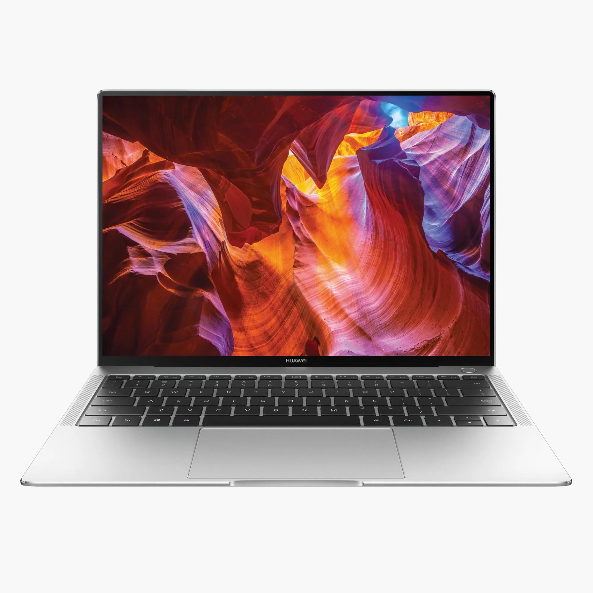 huawei laptop with screen lit up showing colorful abstract patterns