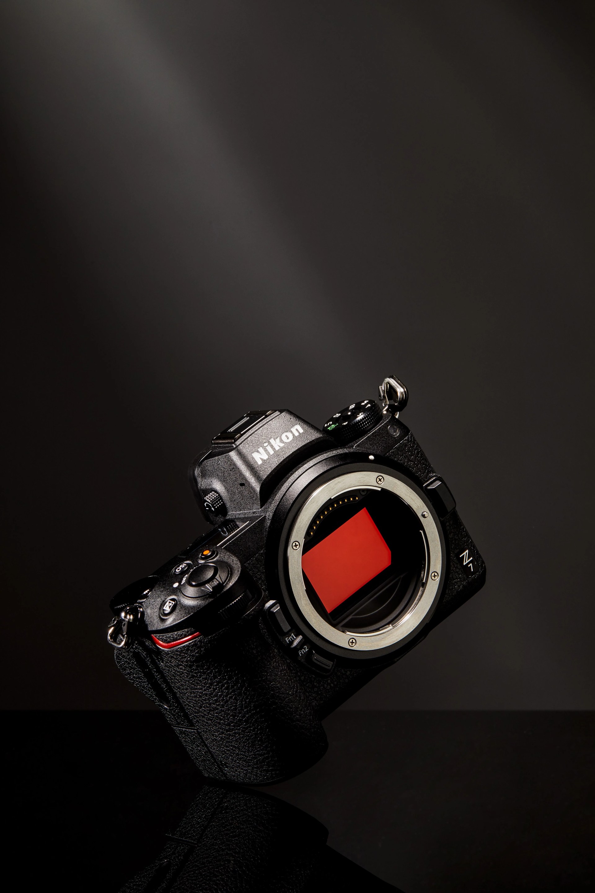 black nikon camera without lens