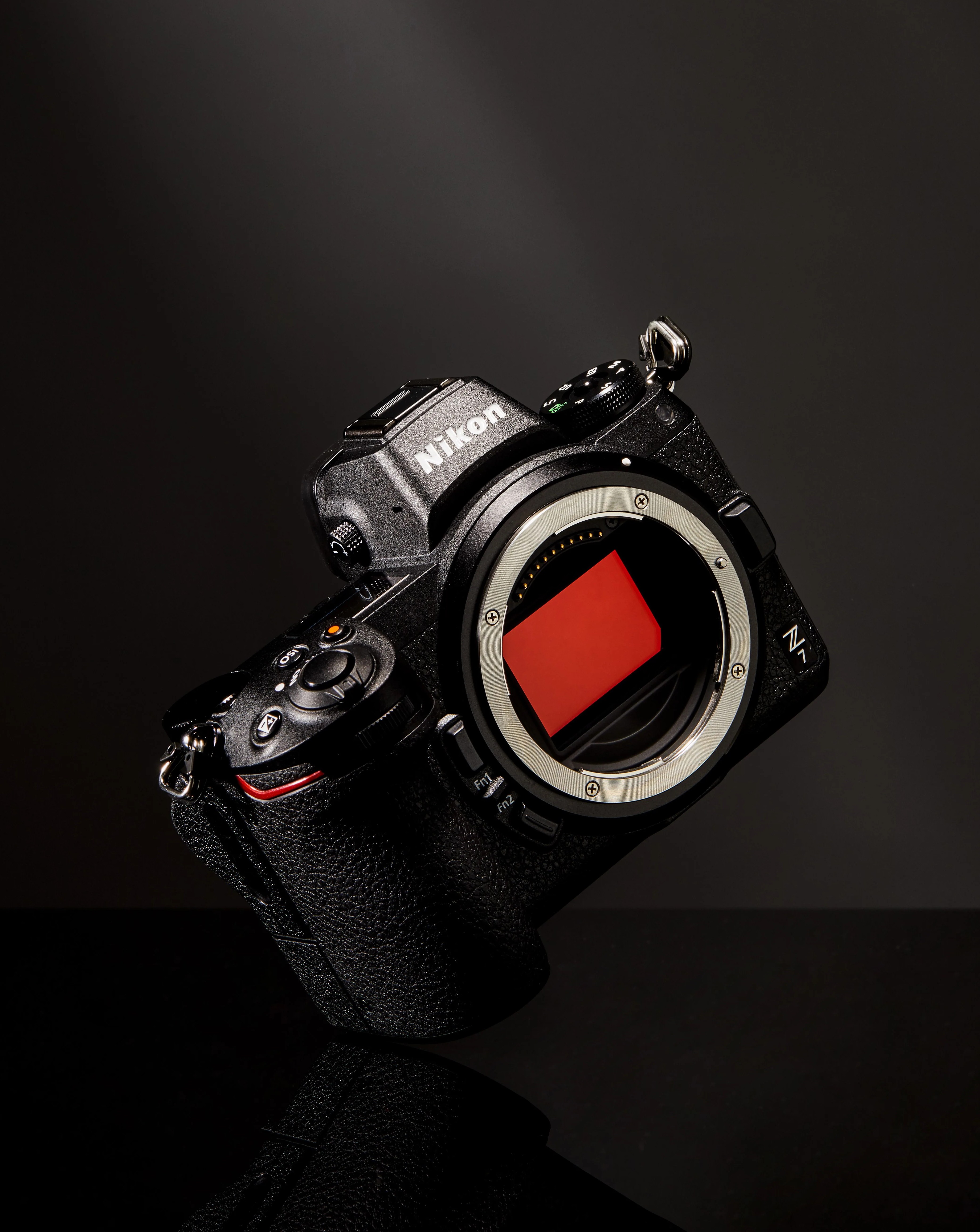 black nikon camera without lens