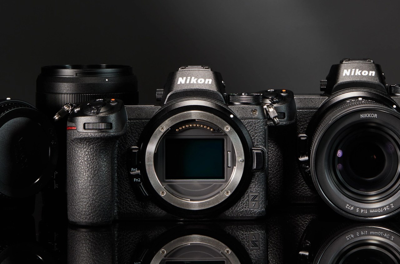 black nikon camera without lens
