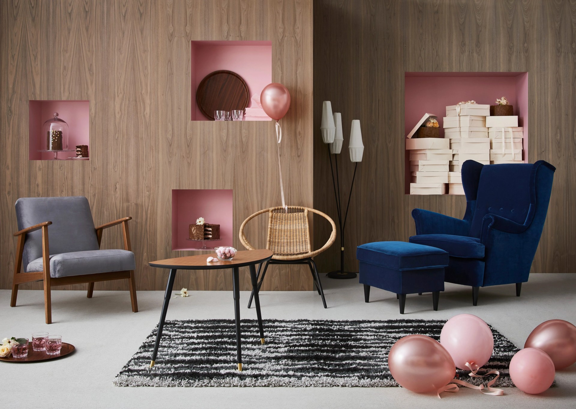 modern interior with pink balloons strewn on the floor