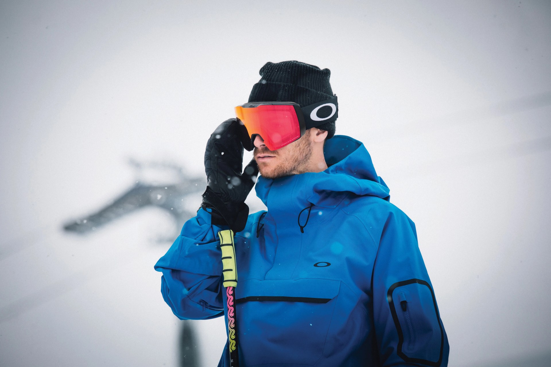 person wearing oakley goggles in snow