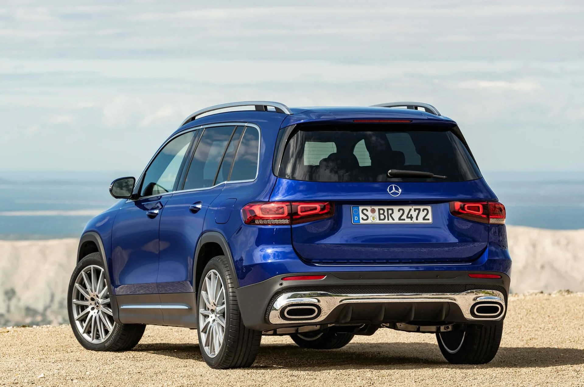 mercedes benz glb parked on a cliff with ocean in the background