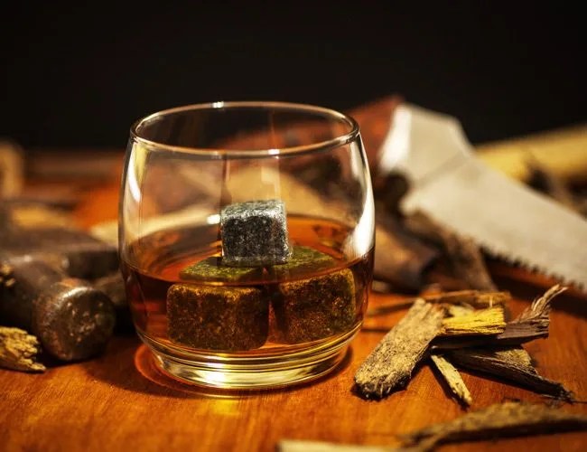 wiskey on the rocks in carpentry studio
