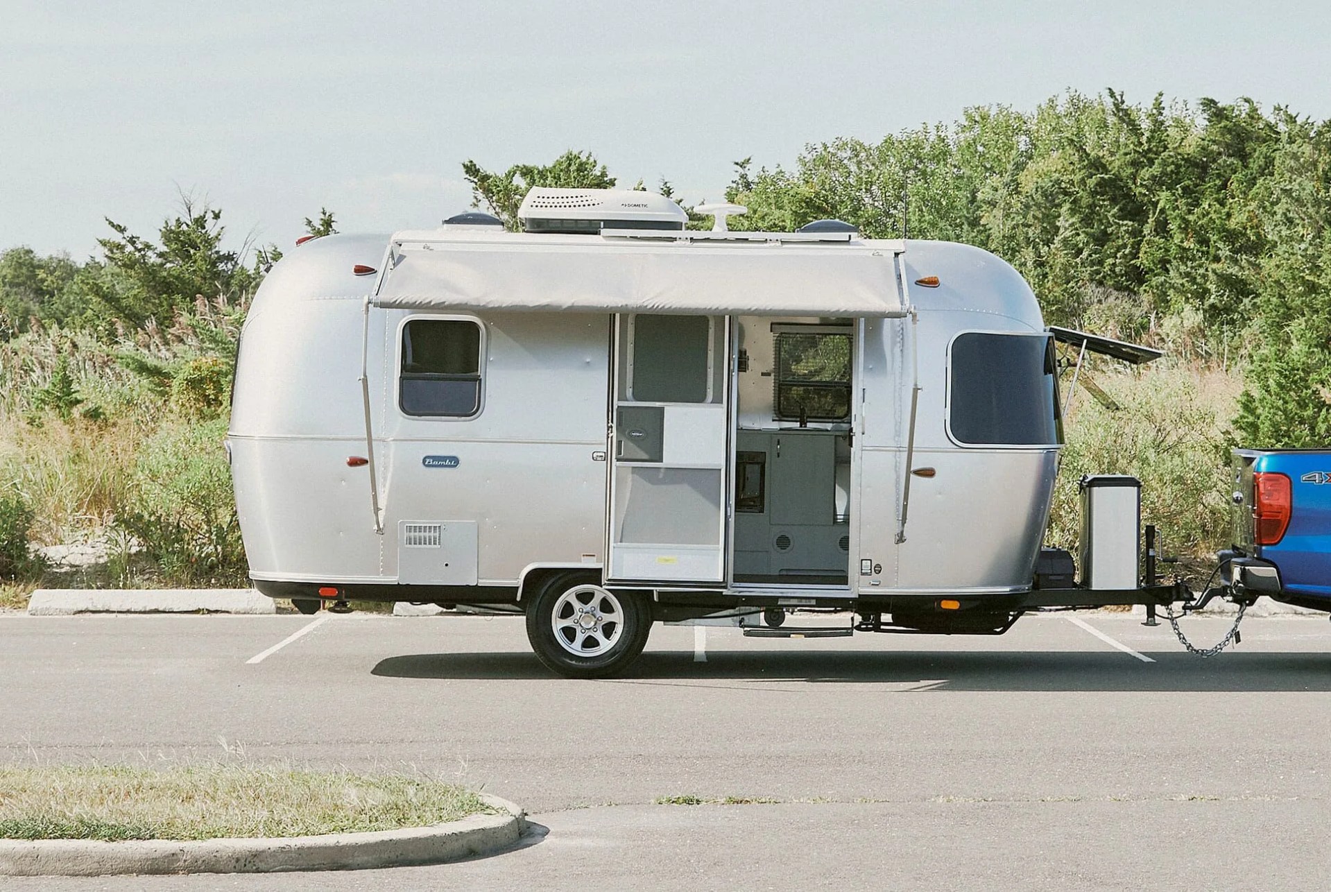 airstream bambi parked in a lot
