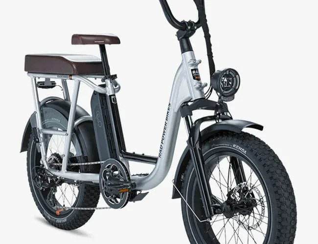 a compact silver e bike with an extra seat on a white background