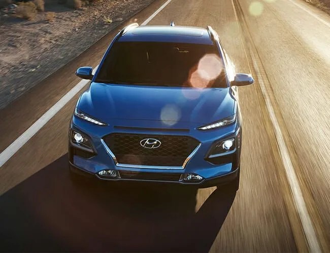 hyundai kona driving on a highway