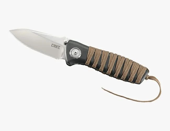 a folding pocket knife with a handle wrapped in brown cord