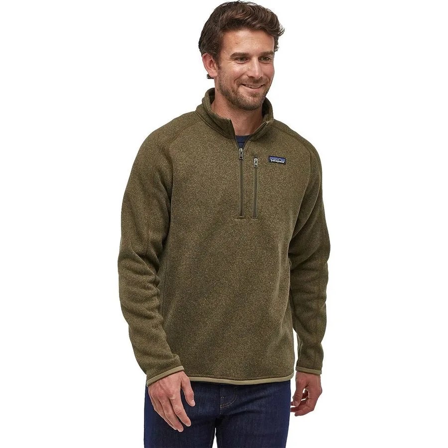 A green Patagonia fleece on a model with jeans and on a white background.