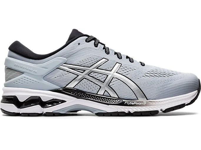 Gray, white and black running sneaker on a white background.