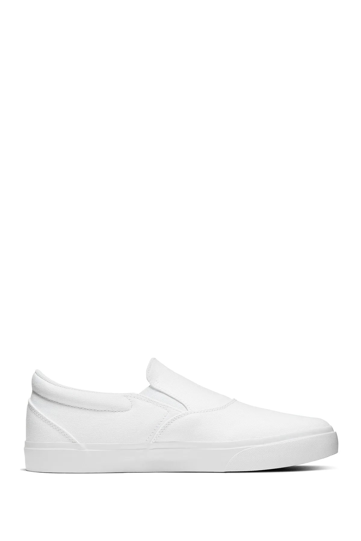 A white slip-on sneaker on a white background.