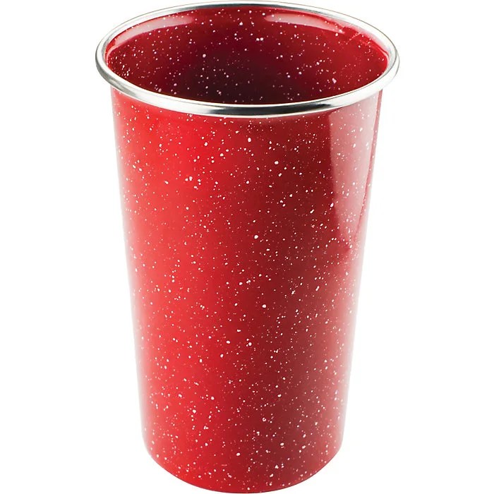 a red pint glass with white speckles
