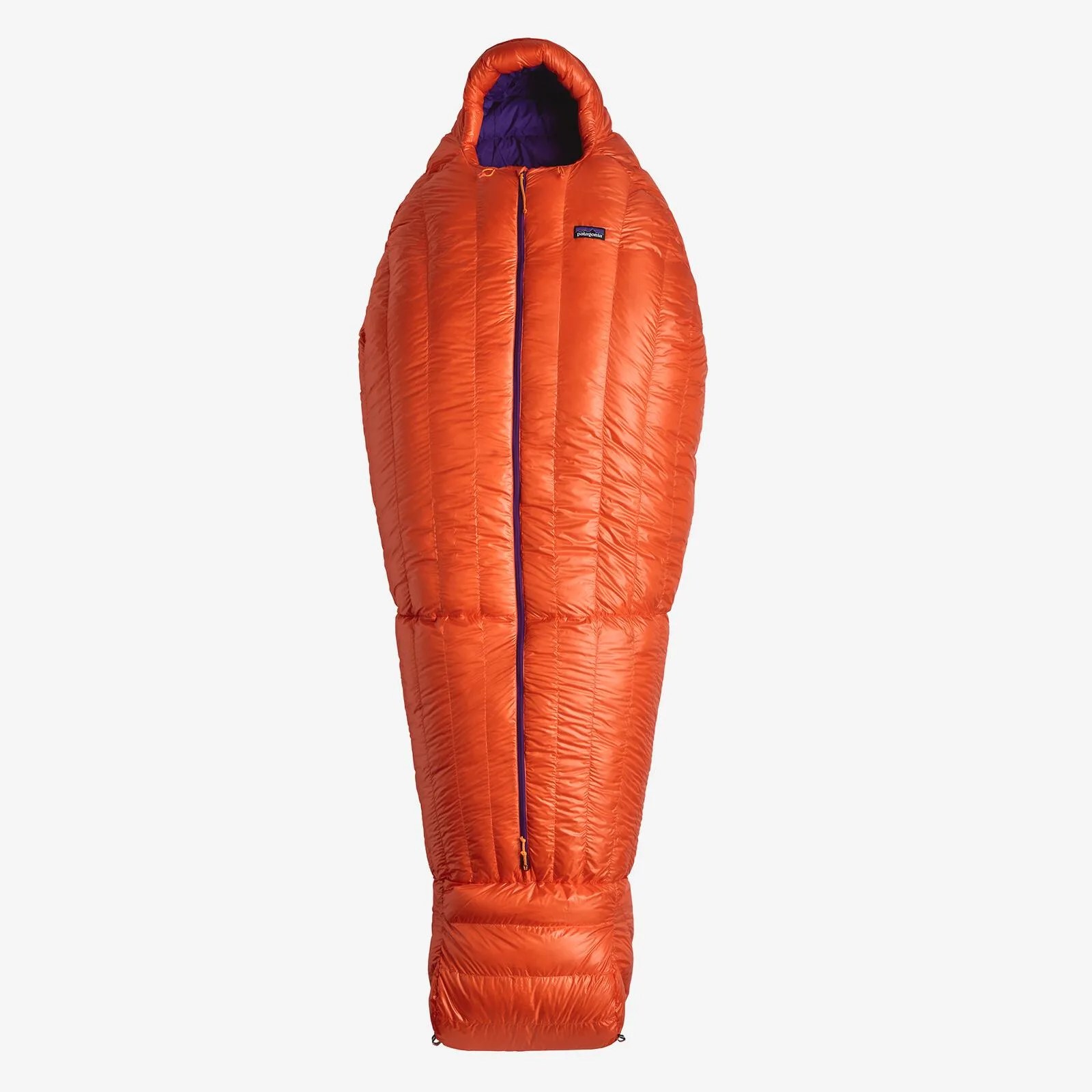 an orange mummy-style sleeping bag with a purple zipper up the front