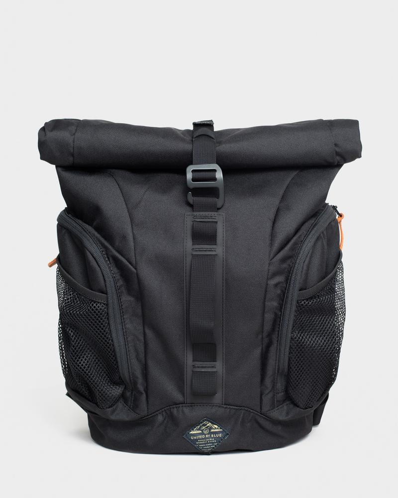A black rolltop backpack on a gray background.