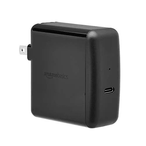 A black AmazonBasics MacBook charger