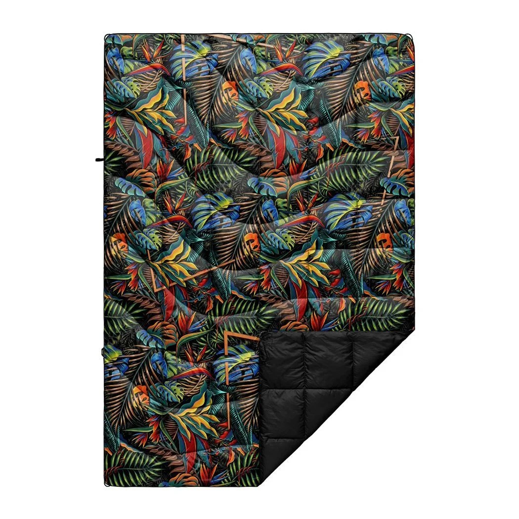 A black insulated quilt with a colorful jungle plant pattern