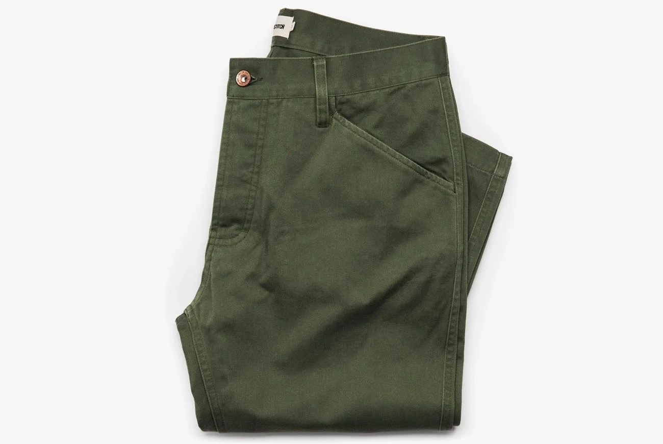 olive green pants on white background