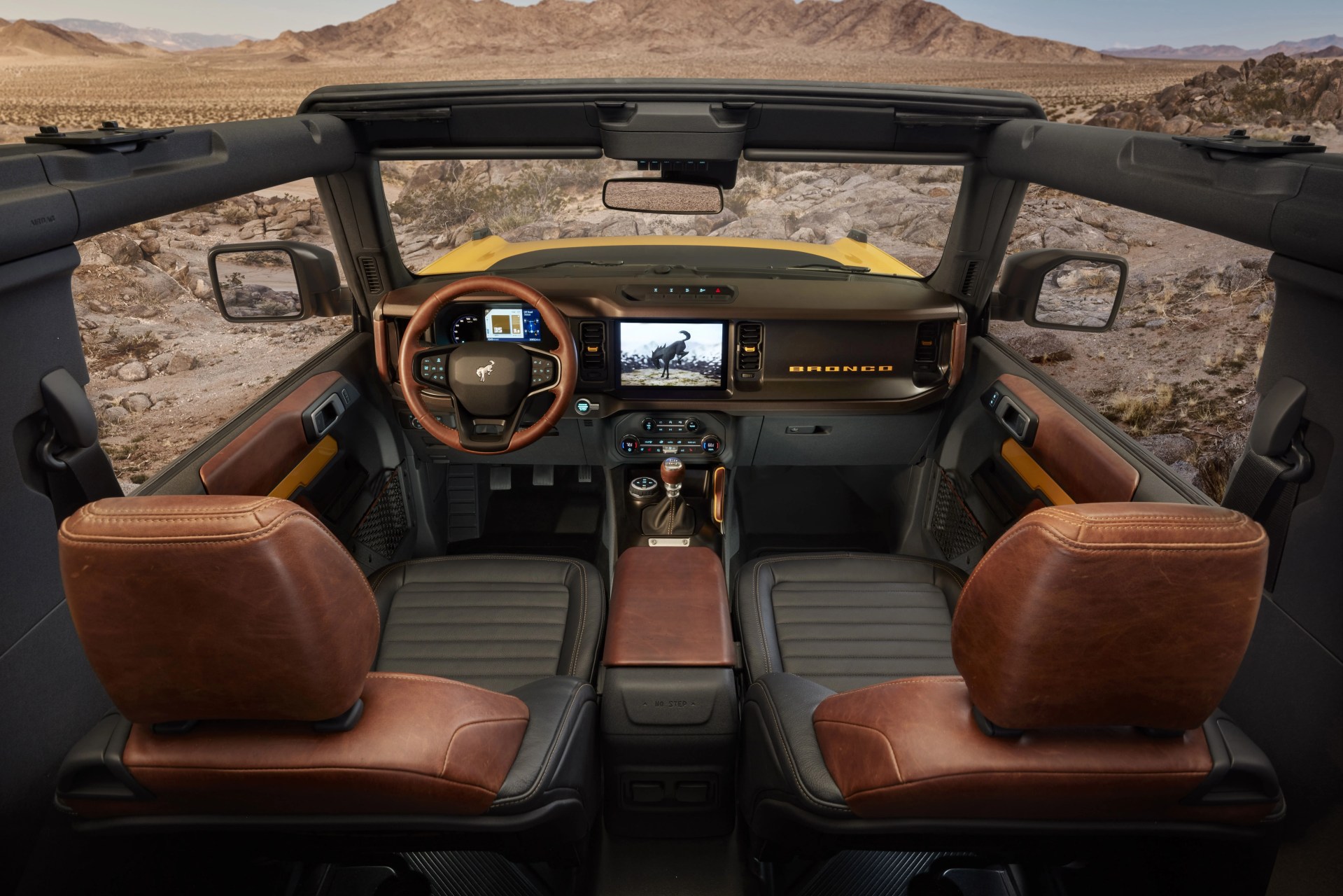 2021 bronco two door features class leading open air design roof and instrument panel inspired by the first generation bronco, with intuitive, clearly visible gauges and controls in this prototype version not representative of production model prototype not representative of production model static display on private property with aftermarket accessories not available for sale