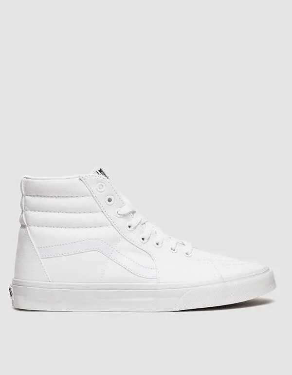White hi-top sneakers on a gray background.