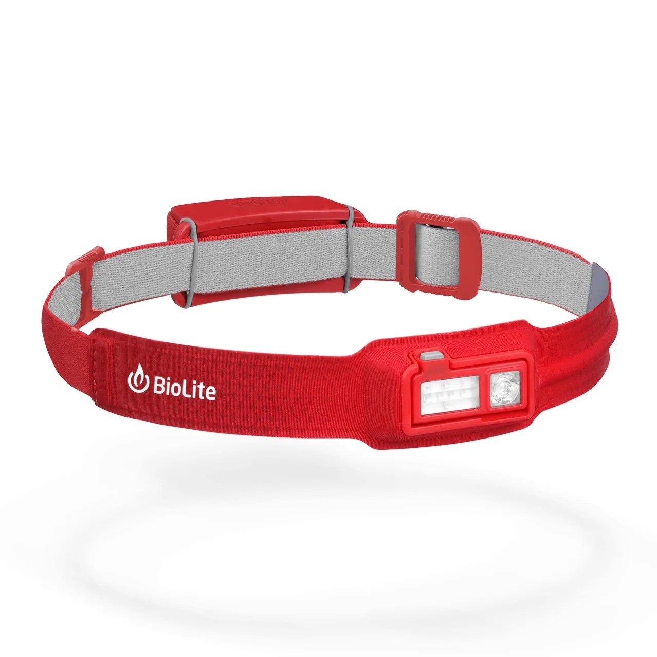 A red headlamp on a gray background.