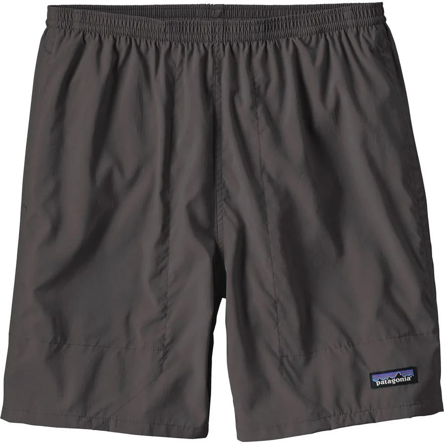 Black polyester elastic shorts on a white background.