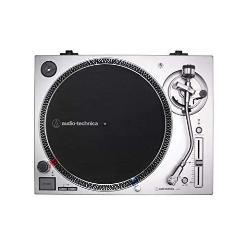 a silver audio technica turntable with a black mat