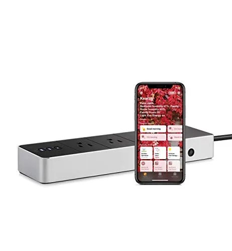 A black and silver surge protector with an iPhone
