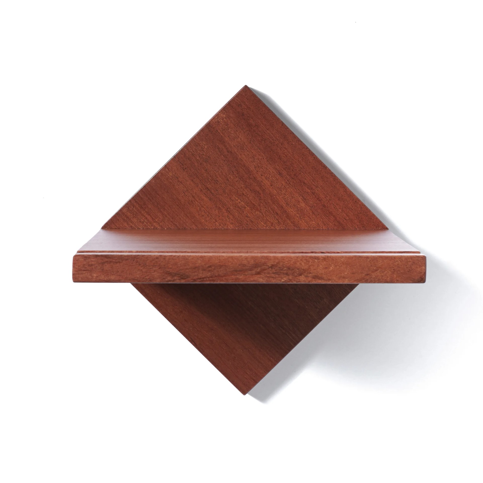 A mahogany wood bike shelf on a white wall.
