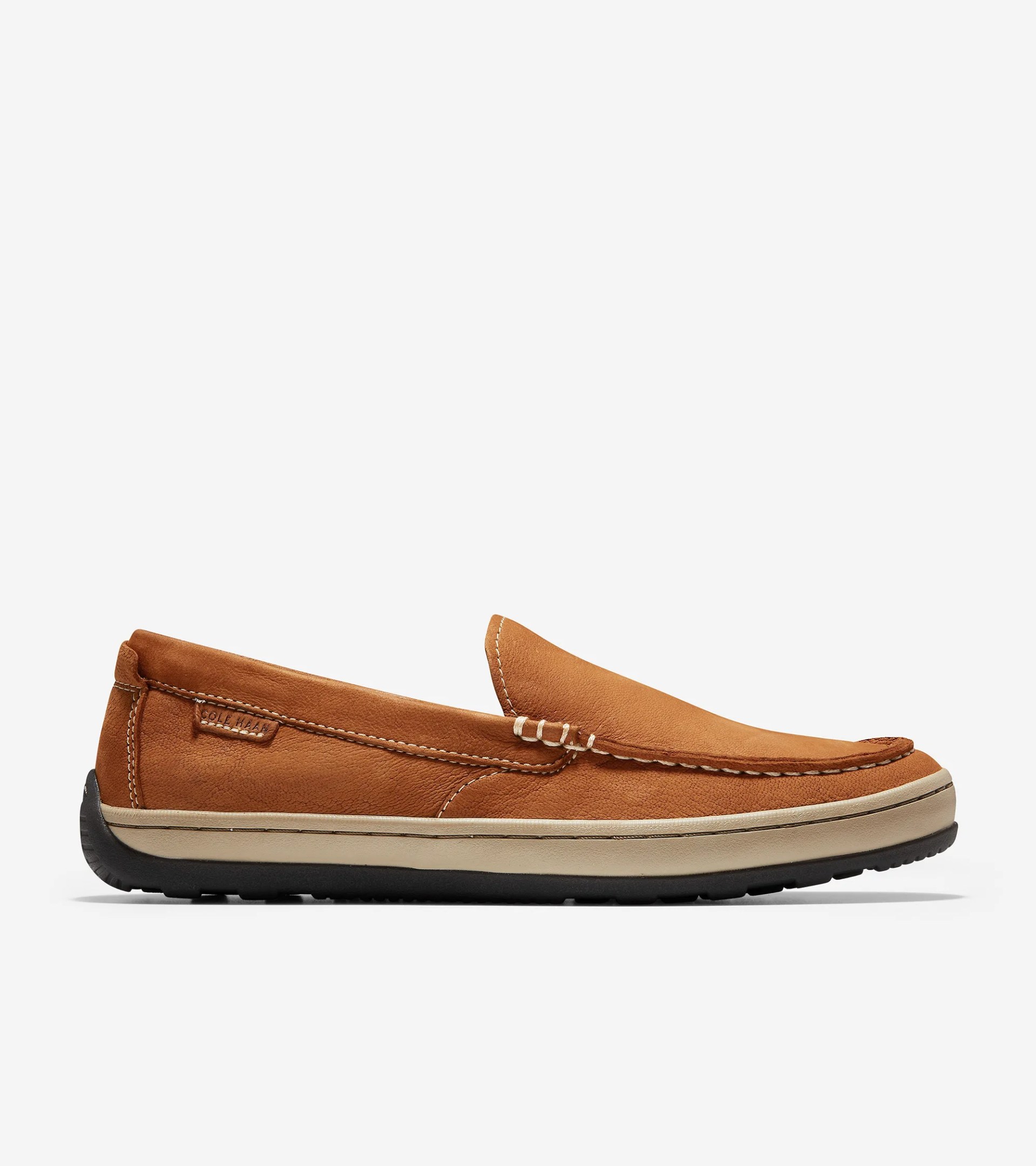 A brown loafer on a gray background.