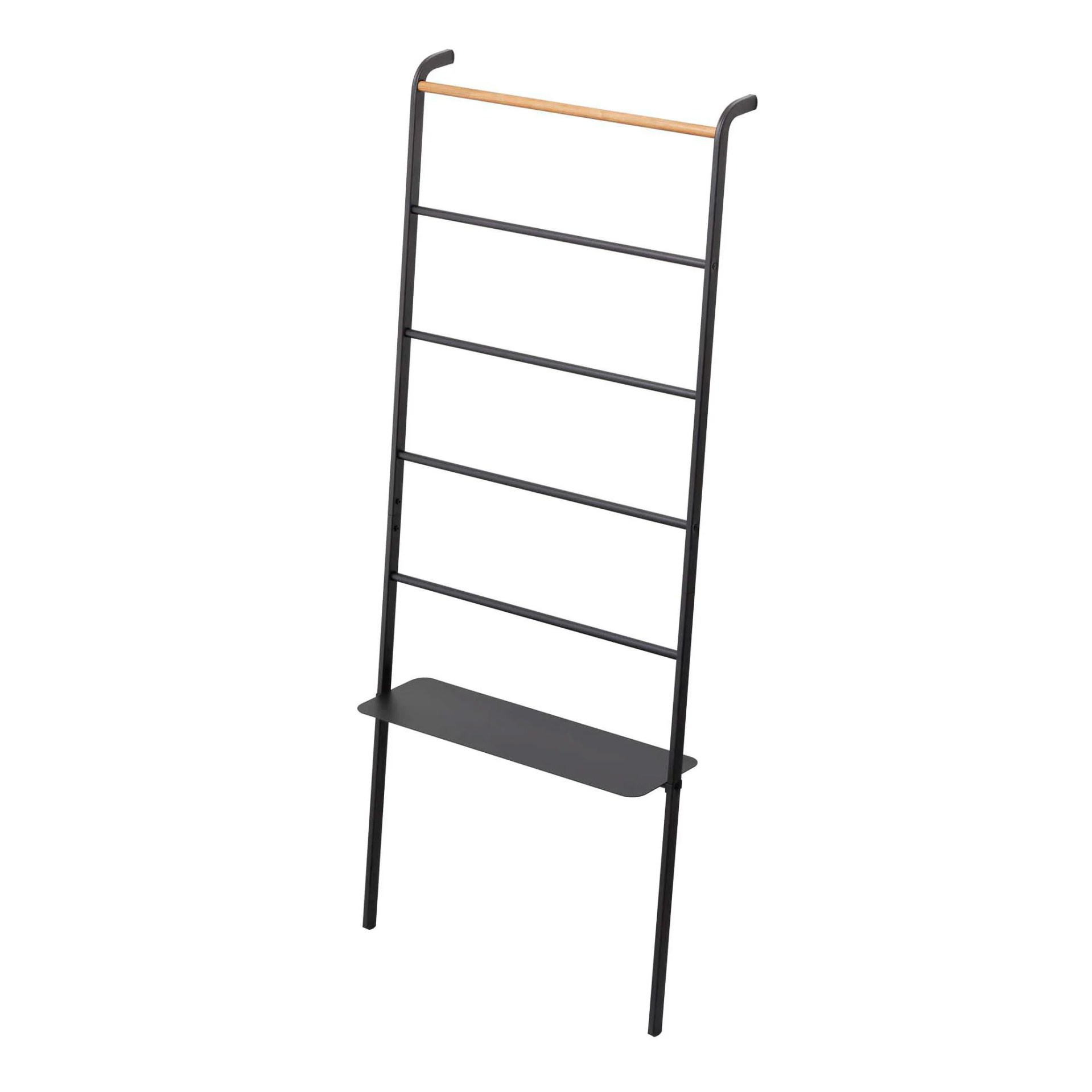 A leaning wall shelf on a gray background.