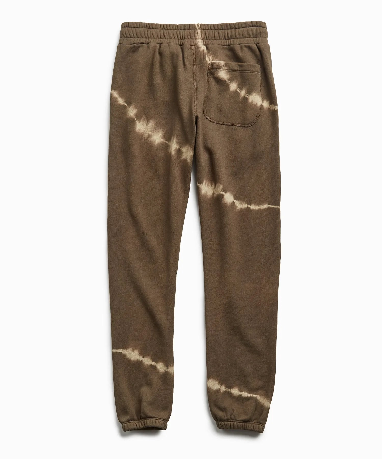 Olive tie dye sweatpants on a gray background.