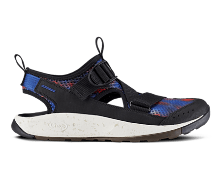 A black and blue sandal/sneaker hybrid on a gray background.