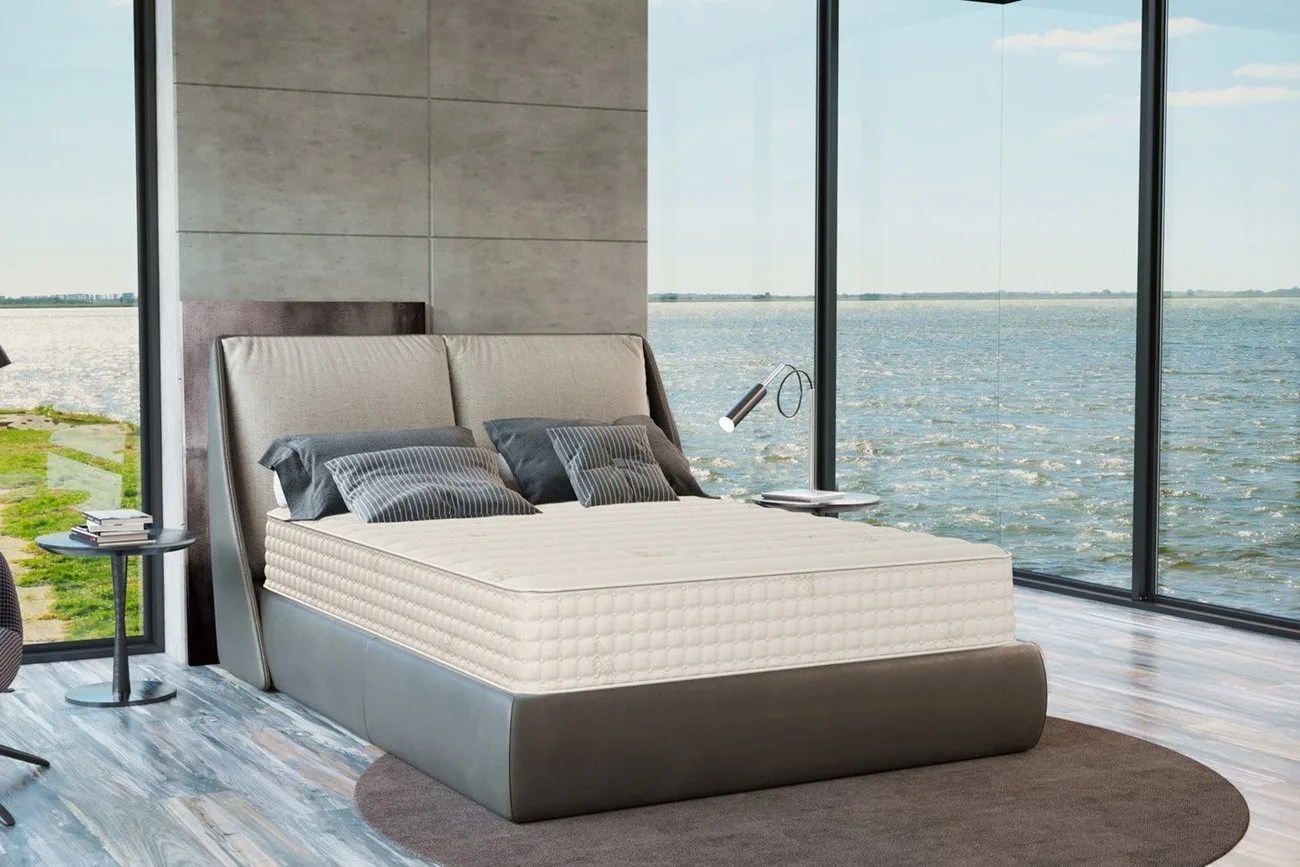 Mattress on frame in bedroom
