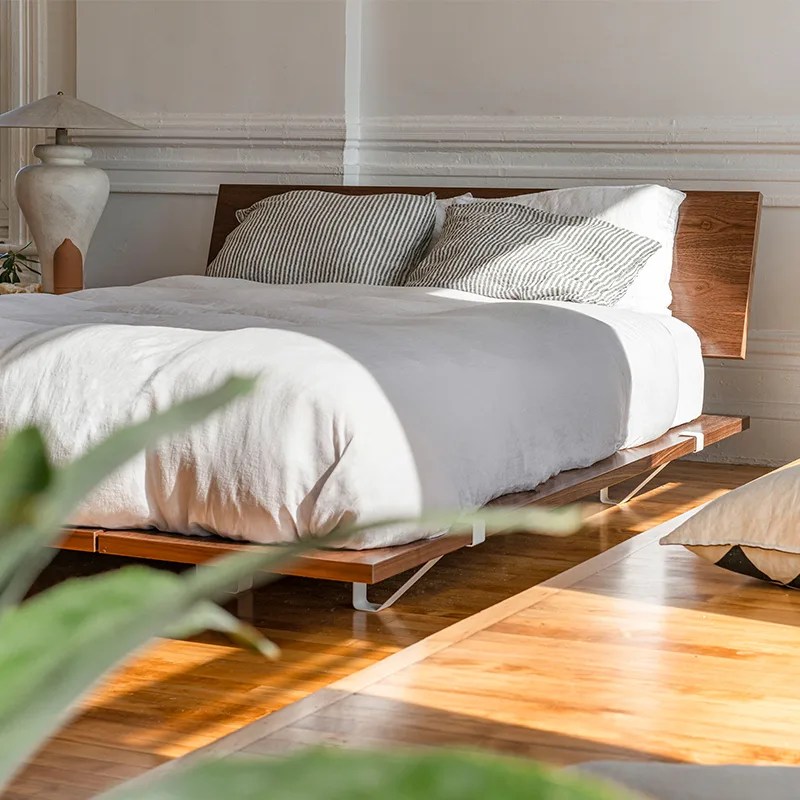 Platform bed shown with mattress