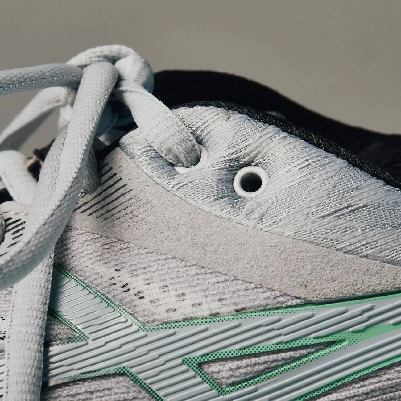 ever wonder what that extra lace hole on your running shoes is for gear patrol lead full