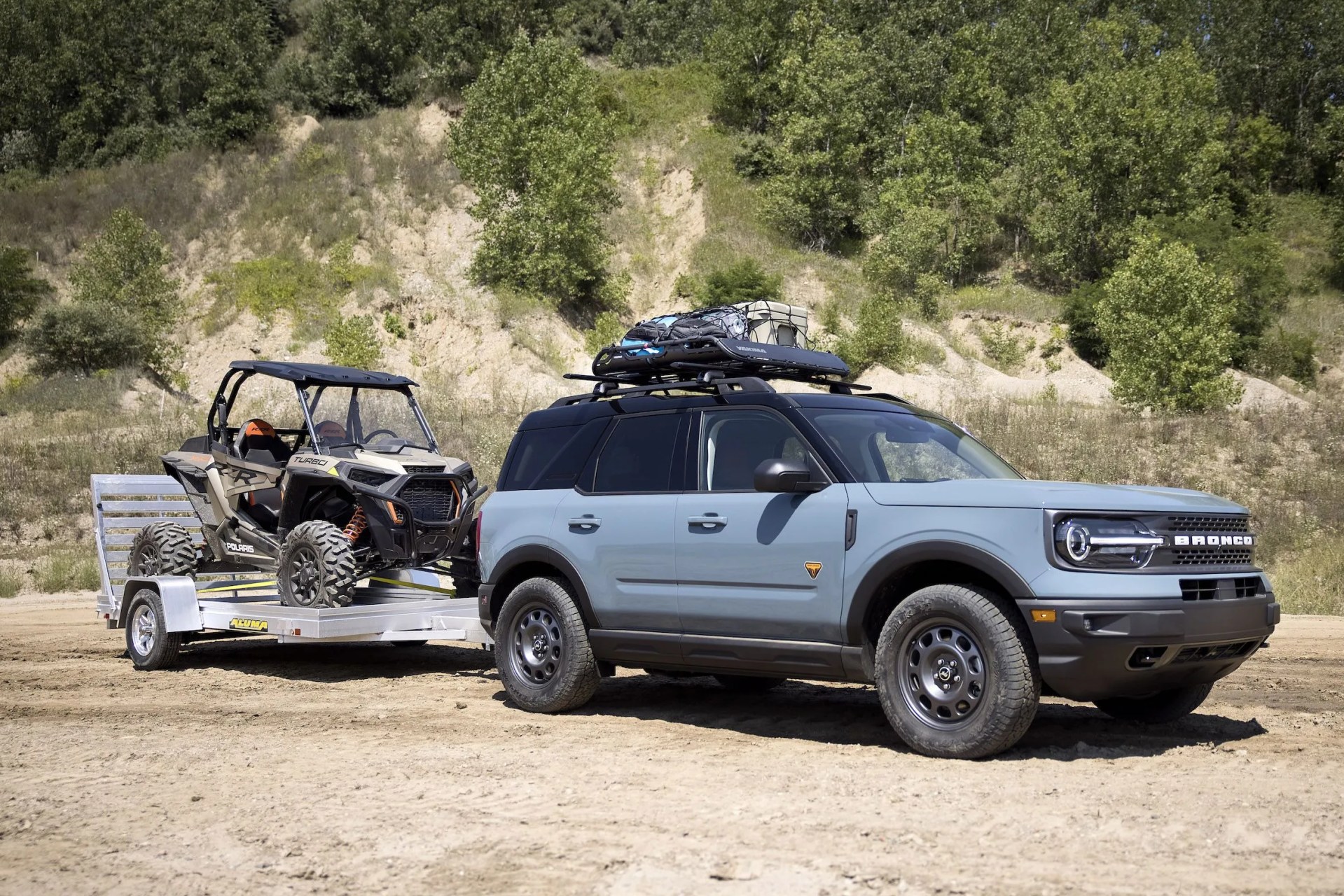 bronco sport tow rzr tow rzr matches the added passenger comfort and technology features of the badlands series with towing and cargo accessories to help adventurers haul more outdoor gear the custom build adds yakima hd bar crossbars and offgrid medium cargo basket and class ii trailer tow package with 2,200 pounds of capacity to tow off road runners like the all new polaris® rzr xp turbo 1000™, unveiled today as part of the bronco birthday celebration preproduction image with optional features shown available late 2020