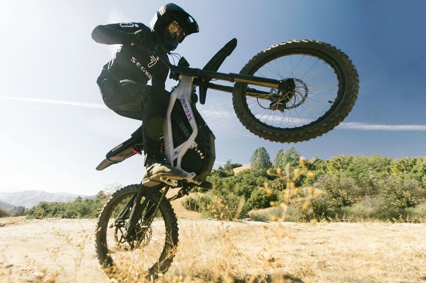 segway dirt bike doing a wheelie