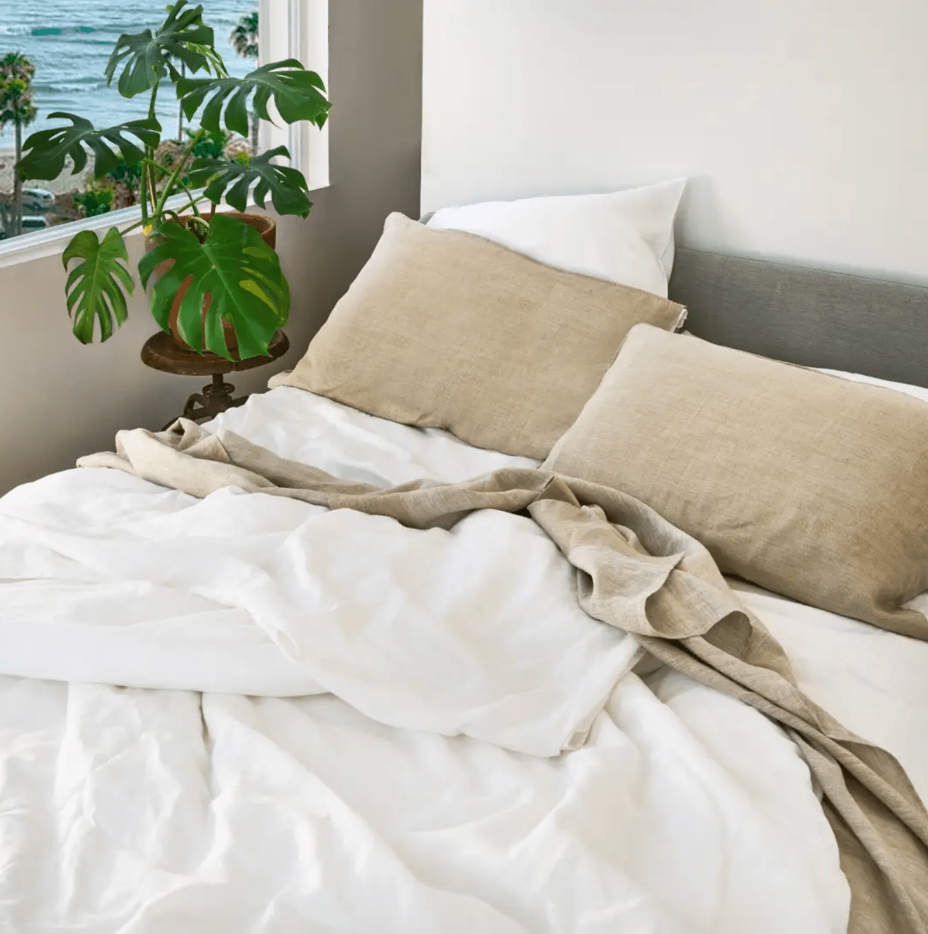 hemp bedding on a bed next to a plant