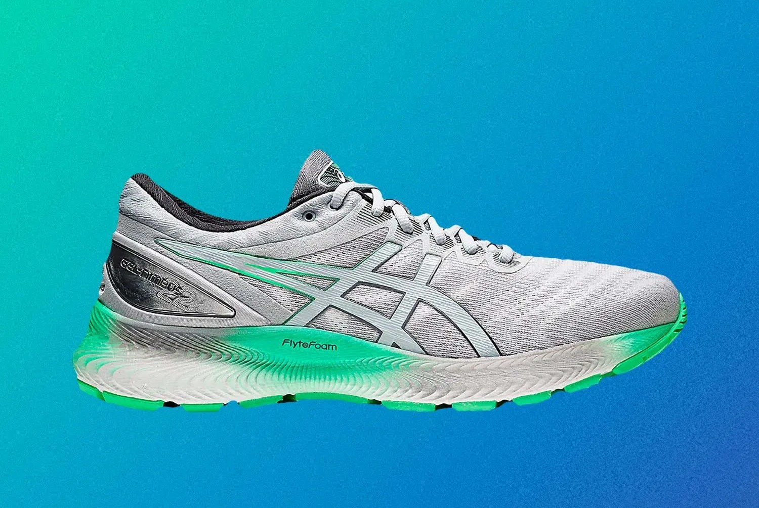 a gray running shoe on a blue background