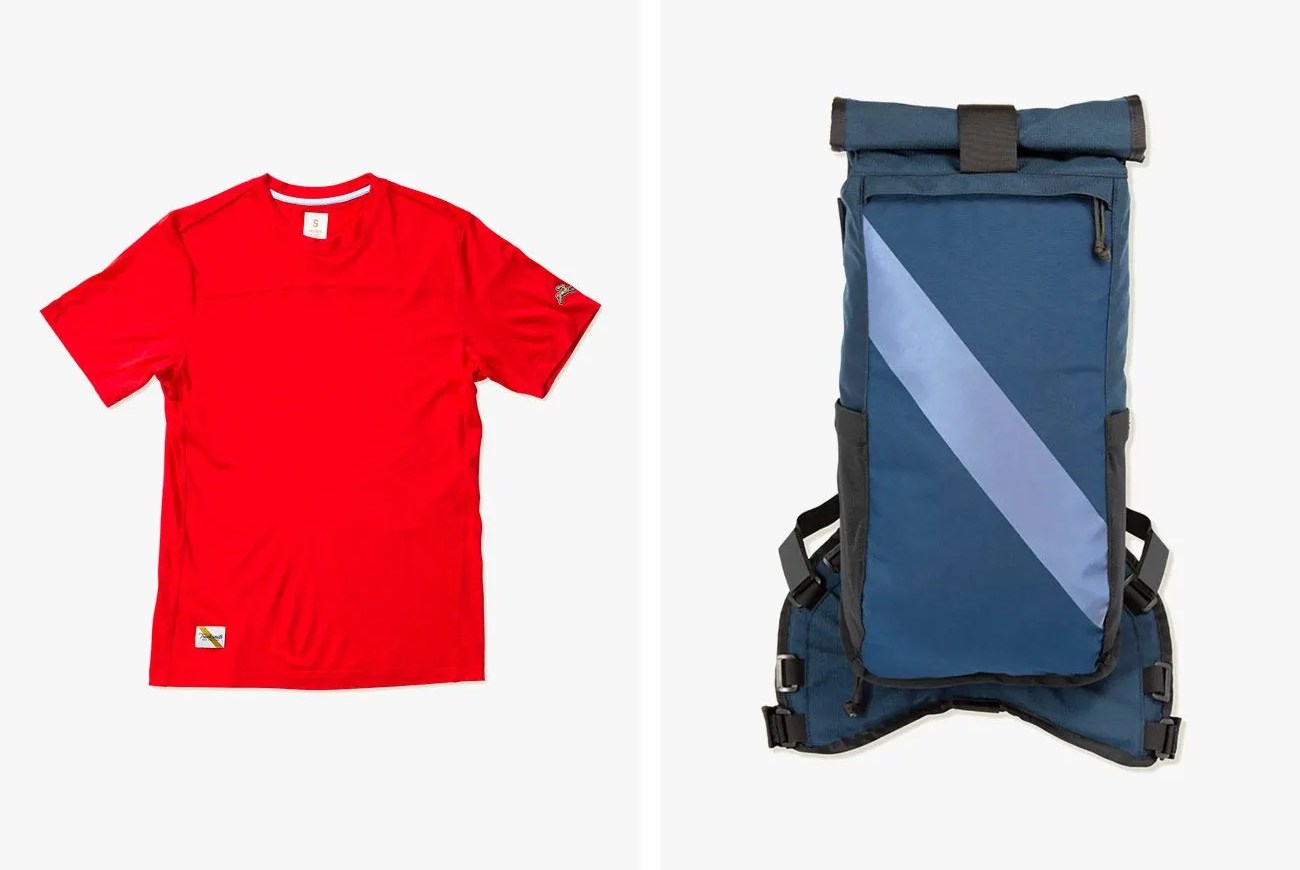a red t shirt and a navy backpack