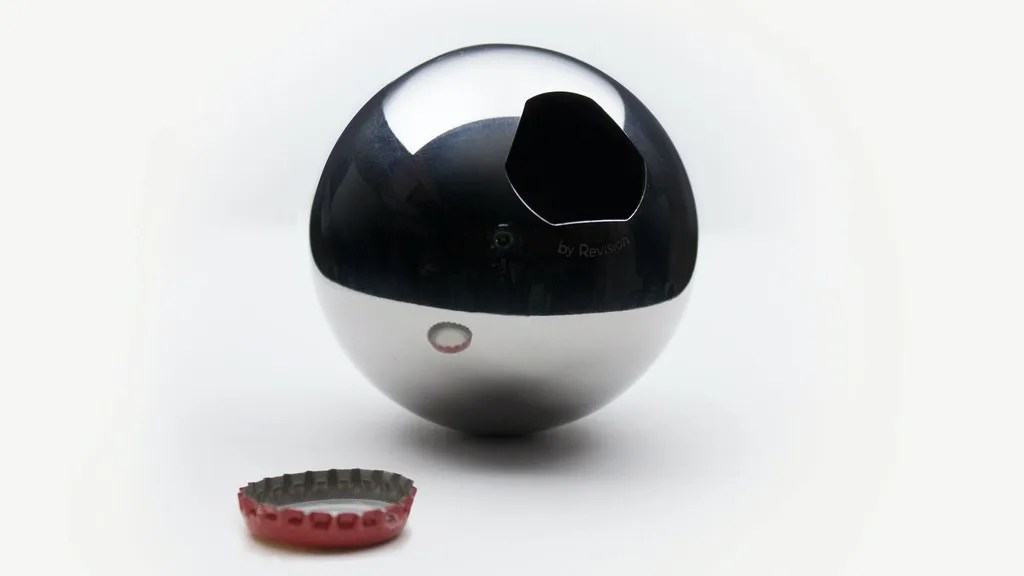 spherical bottle opener next to cap