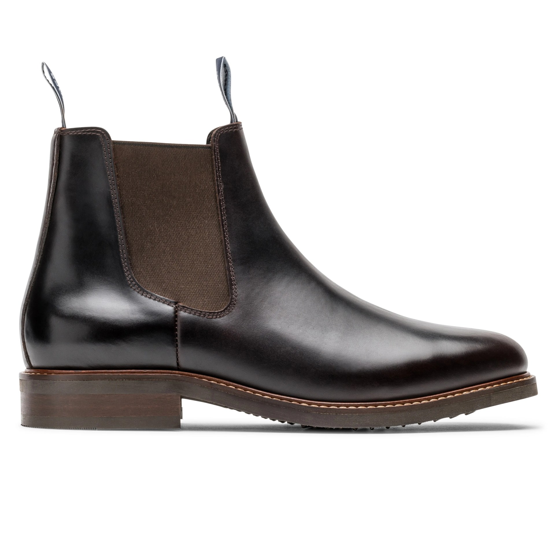 A brown leather Chelsea boot.