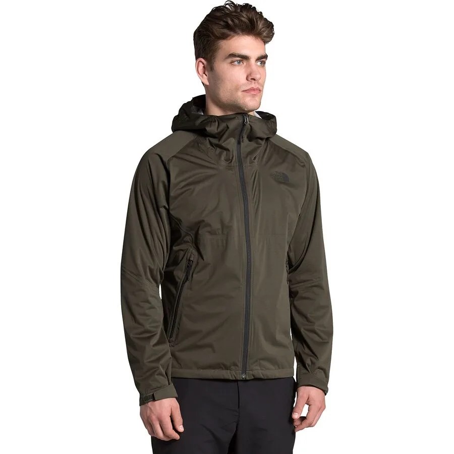 a man wearing a dark brown rain jacket